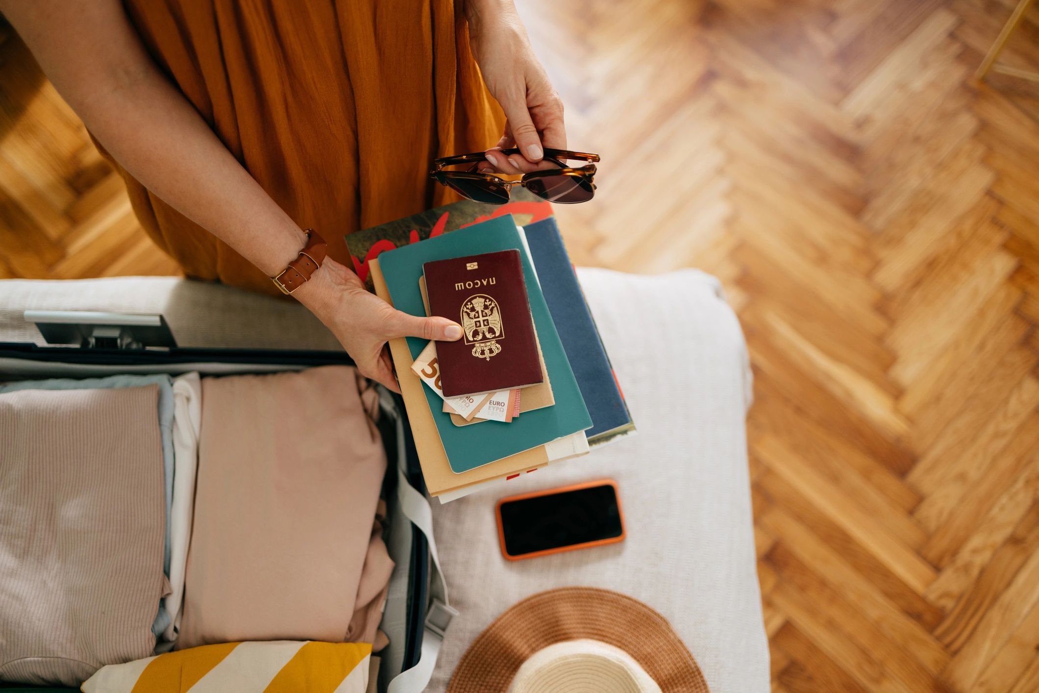 Student preparing passport and travel documents
